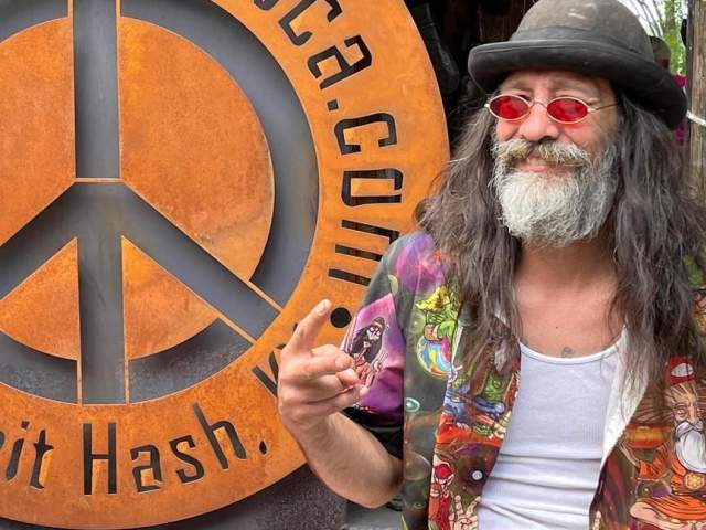 A photo of the long-haired, "hippy" head chef at Chef Hip E's Cocina Loca in Rabbit Hash, Kentucky