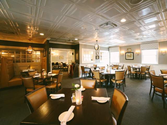 One of the dining rooms at Greyhound Tavern, set for dinner.