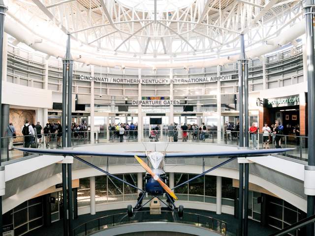An airplane suspended in front of the gate to departures at CVG - the Cincinnati and Northern Kentucky airport