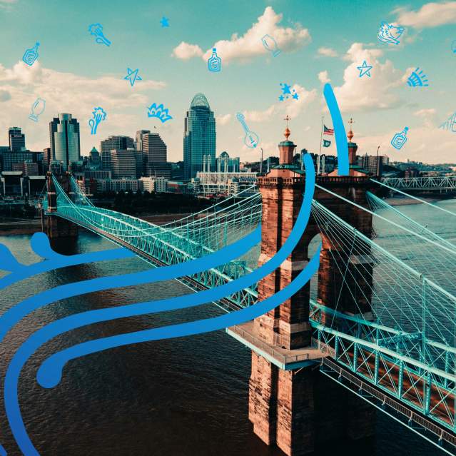 A view of the Roebling Bridge and Cincinnati Skyline with blue hand drawn elements.