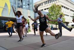 people dancing on the sidewalk at Northern Kentucky University NKU Student Union