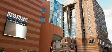 Photo of street level of Northern Kentucky Convention Center with Marriott RiverCenter in view in Covington Ky across the river from Cincinnati Ohio