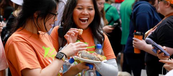 Ladies enjoying food at Asian Food Fest