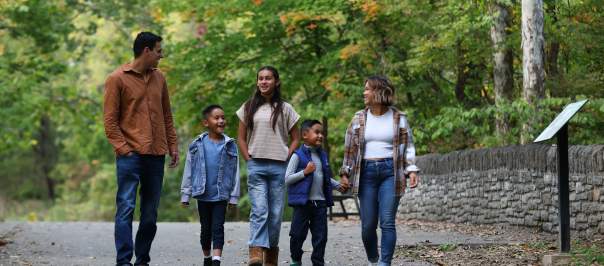 Family walking through Sharon Woods in Sharonville