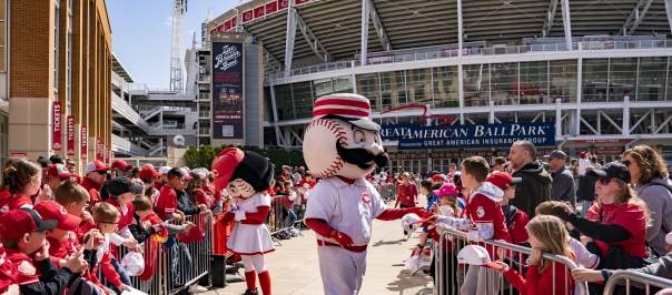A group of baseball fans celebrate Opening Day outside of Great American Ball Park.