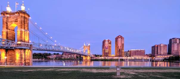 The Roebling Suspension bridge leading to Covington Ky, with the Covington skyline in the background.