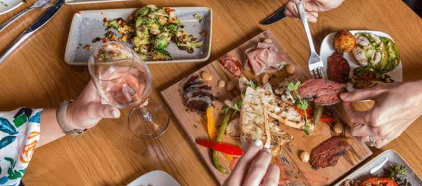 group of people eating dinner