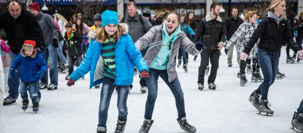 people enjoying ice skating in Cincinnati during the winter