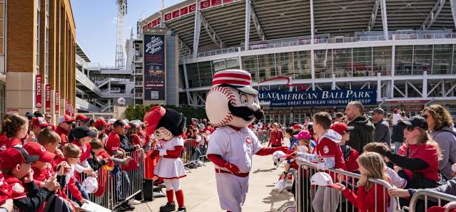 A group of baseball fans celebrate Opening Day outside of Great American Ball Park.