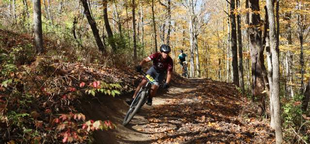 Bikers zip along the Backcountry Trails at Devou Park.