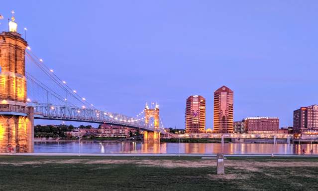 The Roebling Suspension bridge leading to Covington Ky, with the Covington skyline in the background.