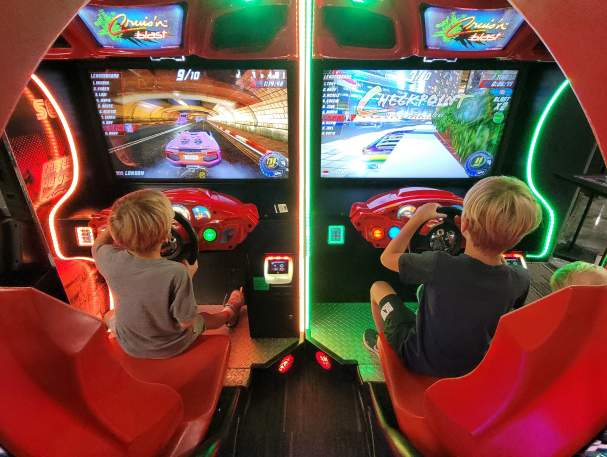 children playing video games at an arcade in Cincinnati