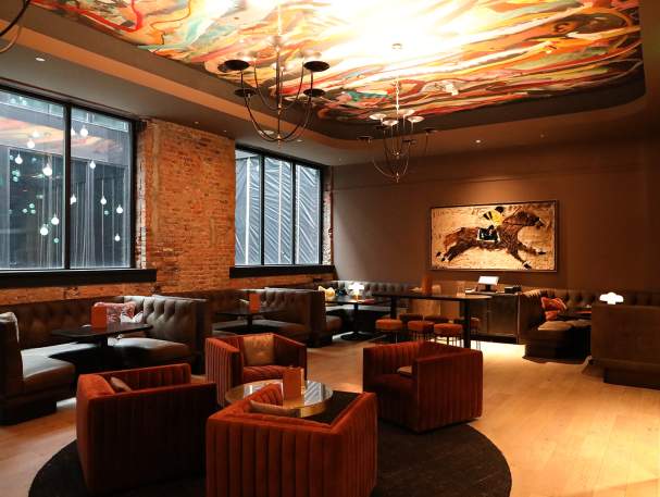Groups of intimate seating in the lounge at Knowledge Bar.