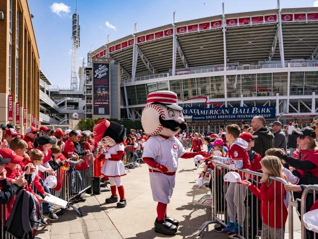 A group of baseball fans celebrate Opening Day outside of Great American Ball Park.