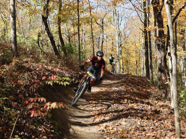 Bikers zip along the Backcountry Trails at Devou Park.