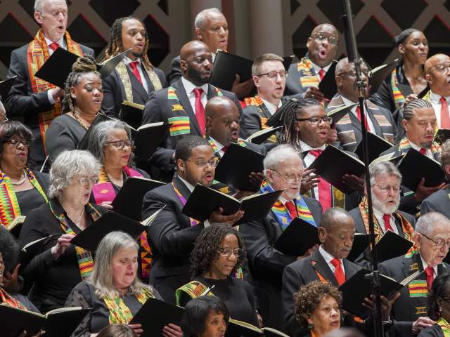 A group of singers perform for the Cincinnati Symphony Orchestra