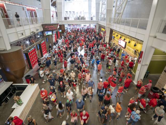 A crowded concourse inside of Great American Ball Park
