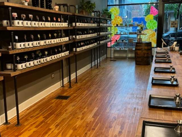 Shelves of fragrances are ready to be mixed to create your own candle.