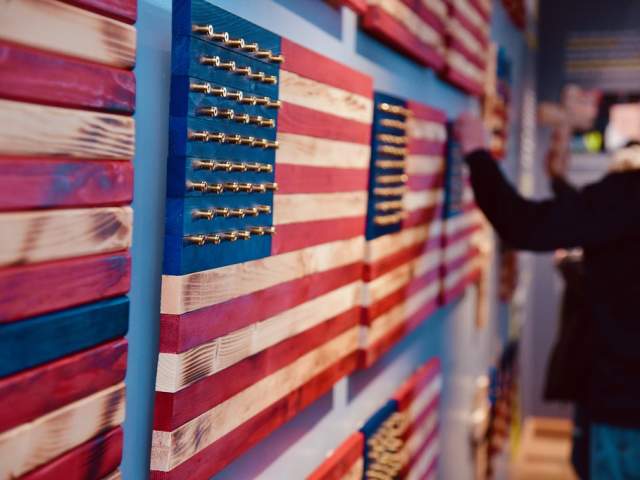 Wooden American Flags hanging on the wall