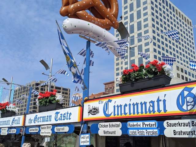Sign made of a big pretzel in front of a food booth at Oktoberfest Zinzinnati