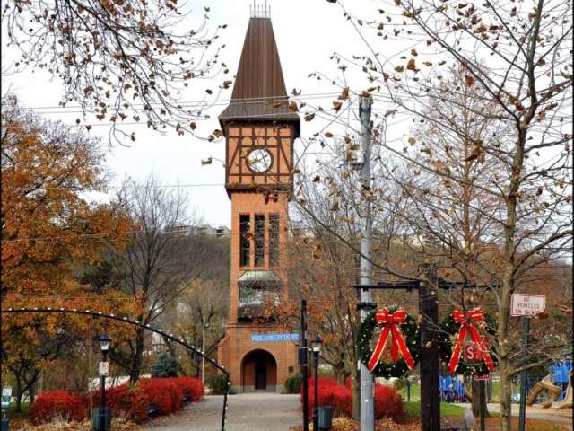 Image is of the Carroll Chimes Bell Tower in Mainstrasse Village during winter.