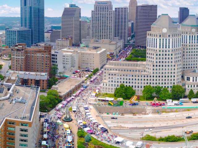 Image is of the Taste of Cincinnati in Downtown Cincinnati from the sky.