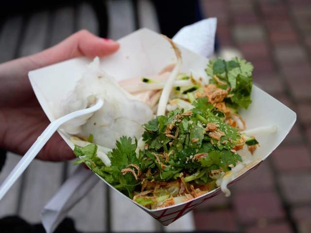 Image is of Asian noodles and salad.