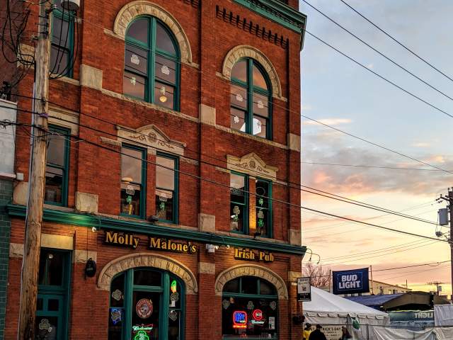 Sunrise behind Molly Malone's Irish Pub