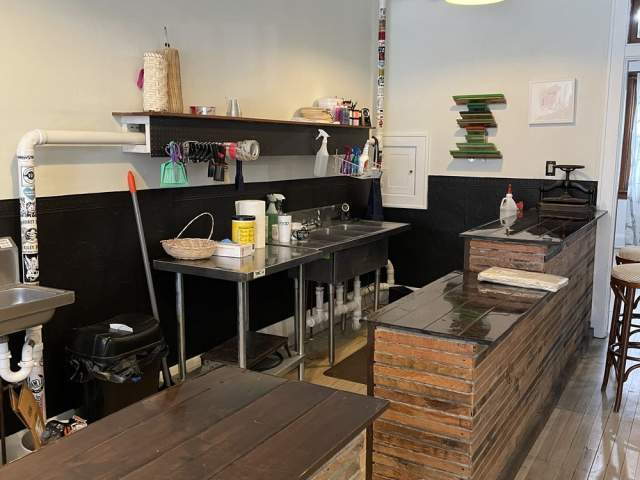 The interior of Spit Bite Studios showing equipment and work space.