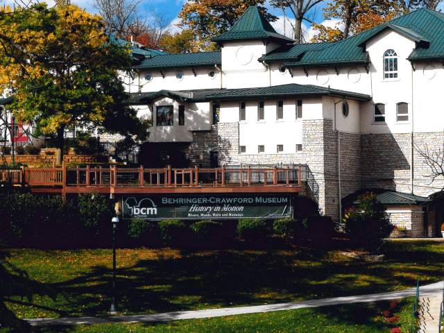 Image is of the Behringer-Crawford Museum on a bright sunny day during the fall.