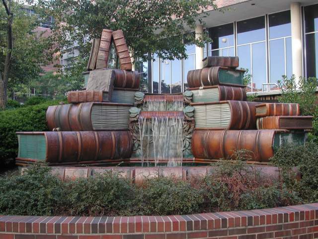 The image is of a water fountain made to look like old timey, thick books.