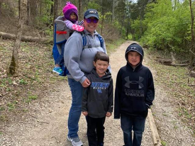 mother with three kids hiking at big bone lick state historic site