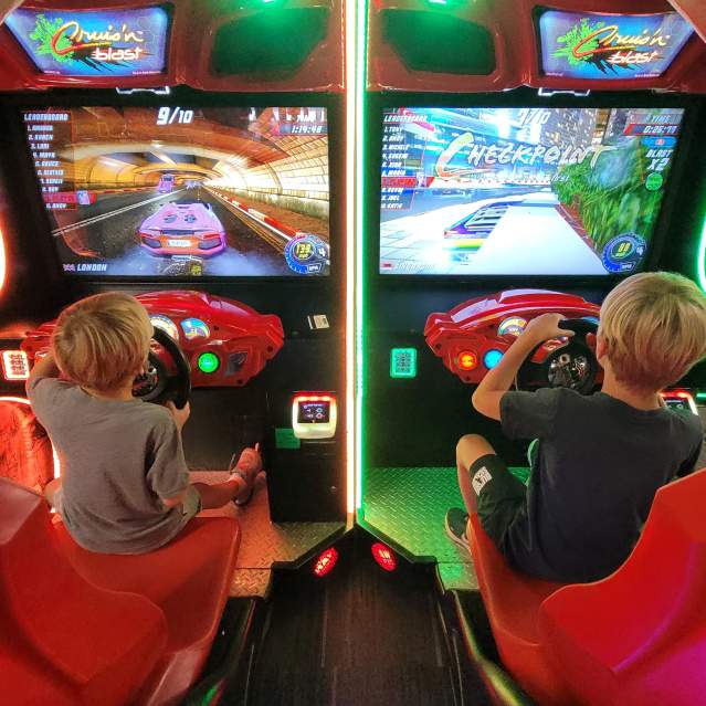 children playing video games at an arcade in Cincinnati