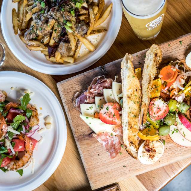 table of food and drinks spread out from Cincinnati
