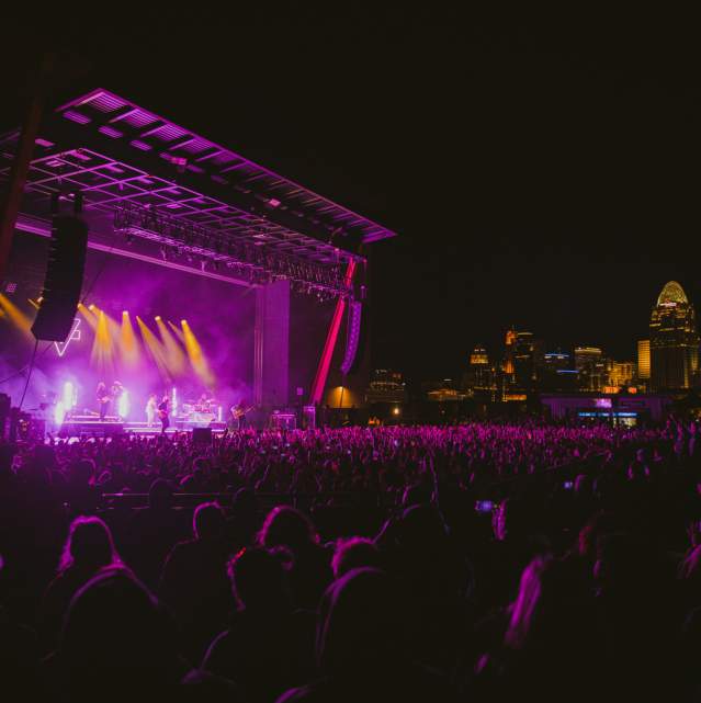MegaCorp Outdoor Concert at Night with Skyline