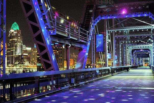 The Purple People Bridge across the Ohio river lighted up for the holidays with the Cincinnati skyline in the background, viewed from Newport, Ky.