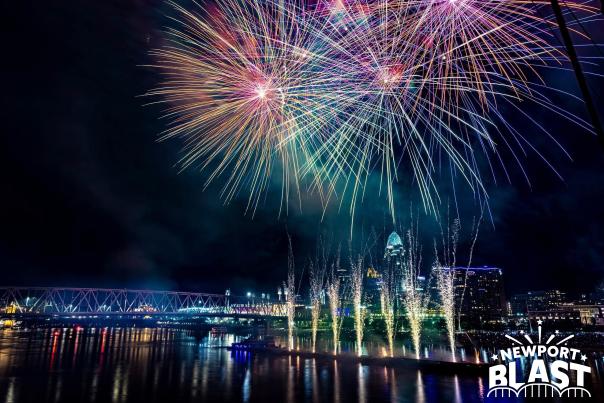 Image is of fireworks over the Ohio River with the City of Cincinnati in the background.