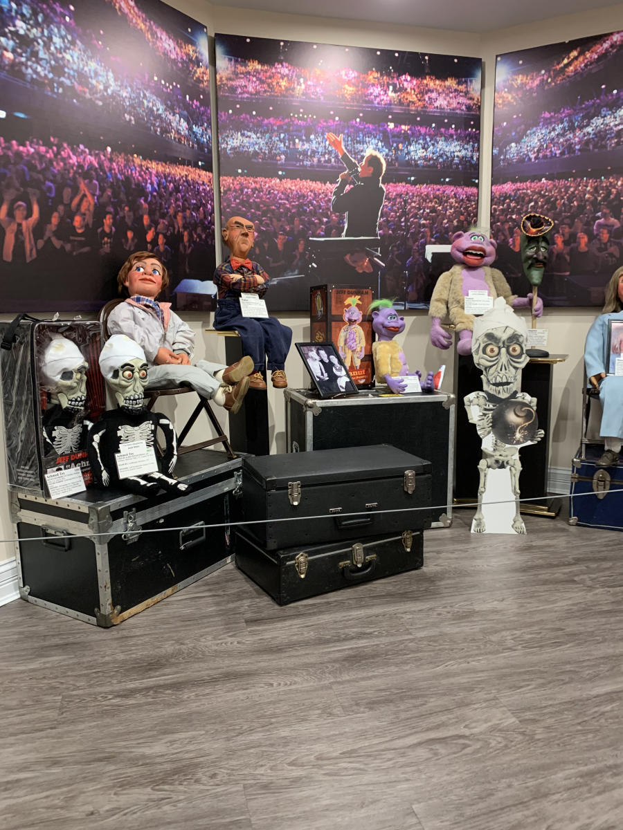 Jeff Dunham puppets and photos of him preforming to sold out arenas.