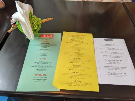 printed menus displayed on the table at olla in covington ky