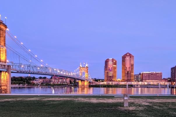 The Roebling Suspension bridge leading to Covington Ky, with the Covington skyline in the background.
