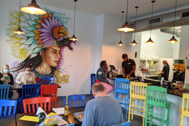 colorful mural on interior wall of Olla in covington, ky