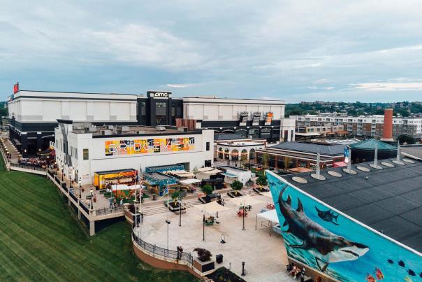 View of Newport on the Levee from a drone with the Aquarium and Bridgeview Box Park in the foreground