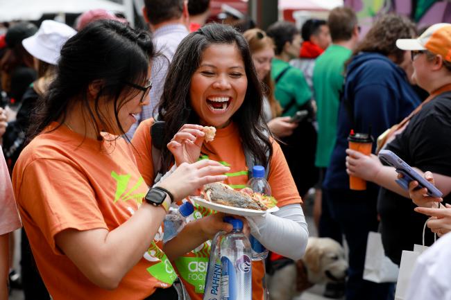 Ladies enjoying food at Asian Food Fest