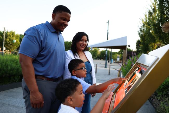 Family at Black Music Walk of Fame exhibit