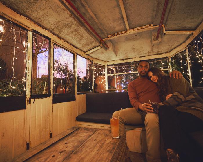 Somerset OTR_Couple at Bar_Patio with Cocktail