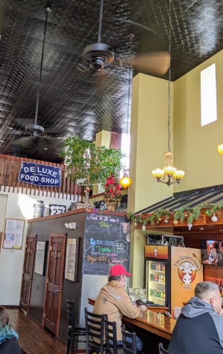 photo of the interior and bar at Elusive Cow restaurant in Bellevue, Ky.