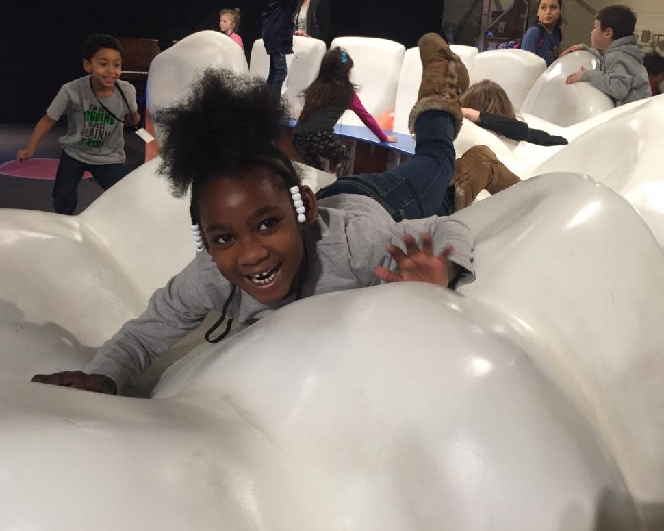 Duke Energy Children's Museum (photo: Cincinnati Museum Center) Girl playing at the Duke Energy Children's Museum (photo: Cincinnati Museum Center)