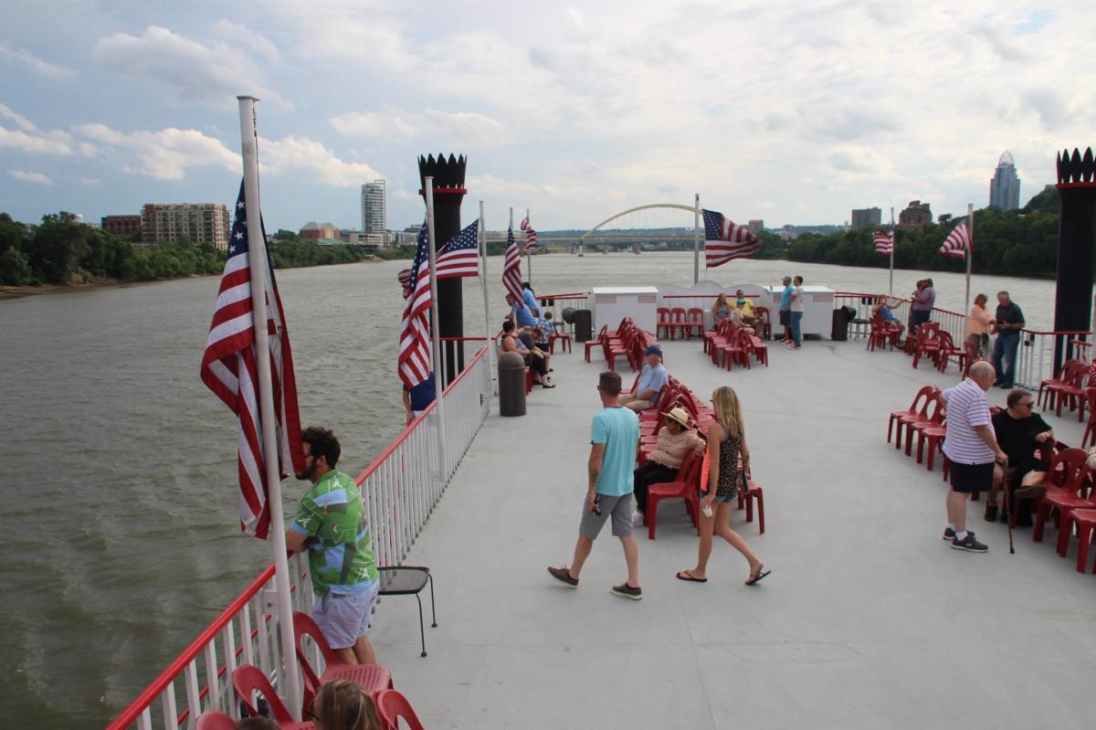View of people looking over the top deck of BB Riverboats cruise on the ohio river