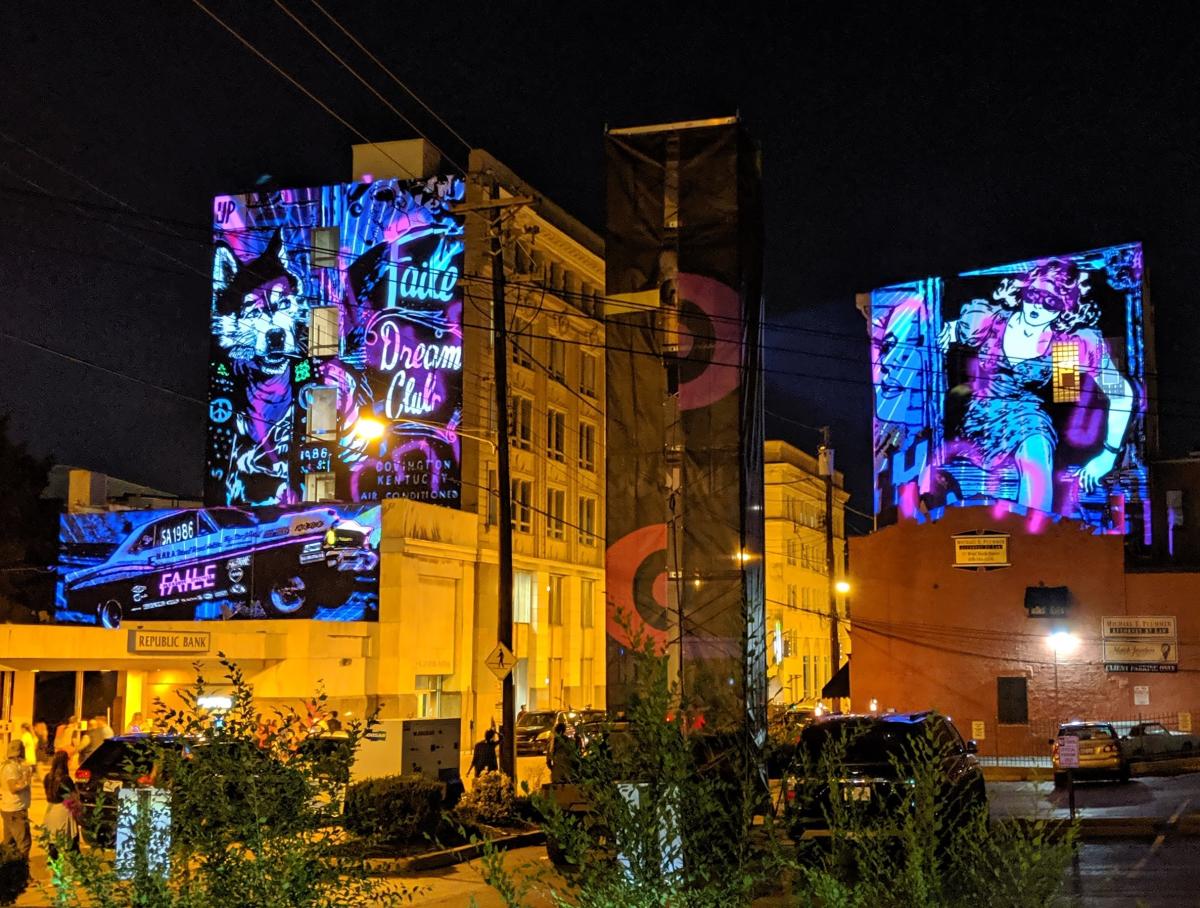 Two Faile murals in Covington, Ky lighted up for BLINK