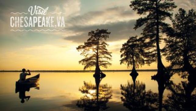 Reflective water Sunset at Lake Drummond Chesapeake, VA puzzle